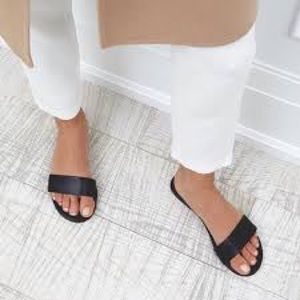 Black leather slides